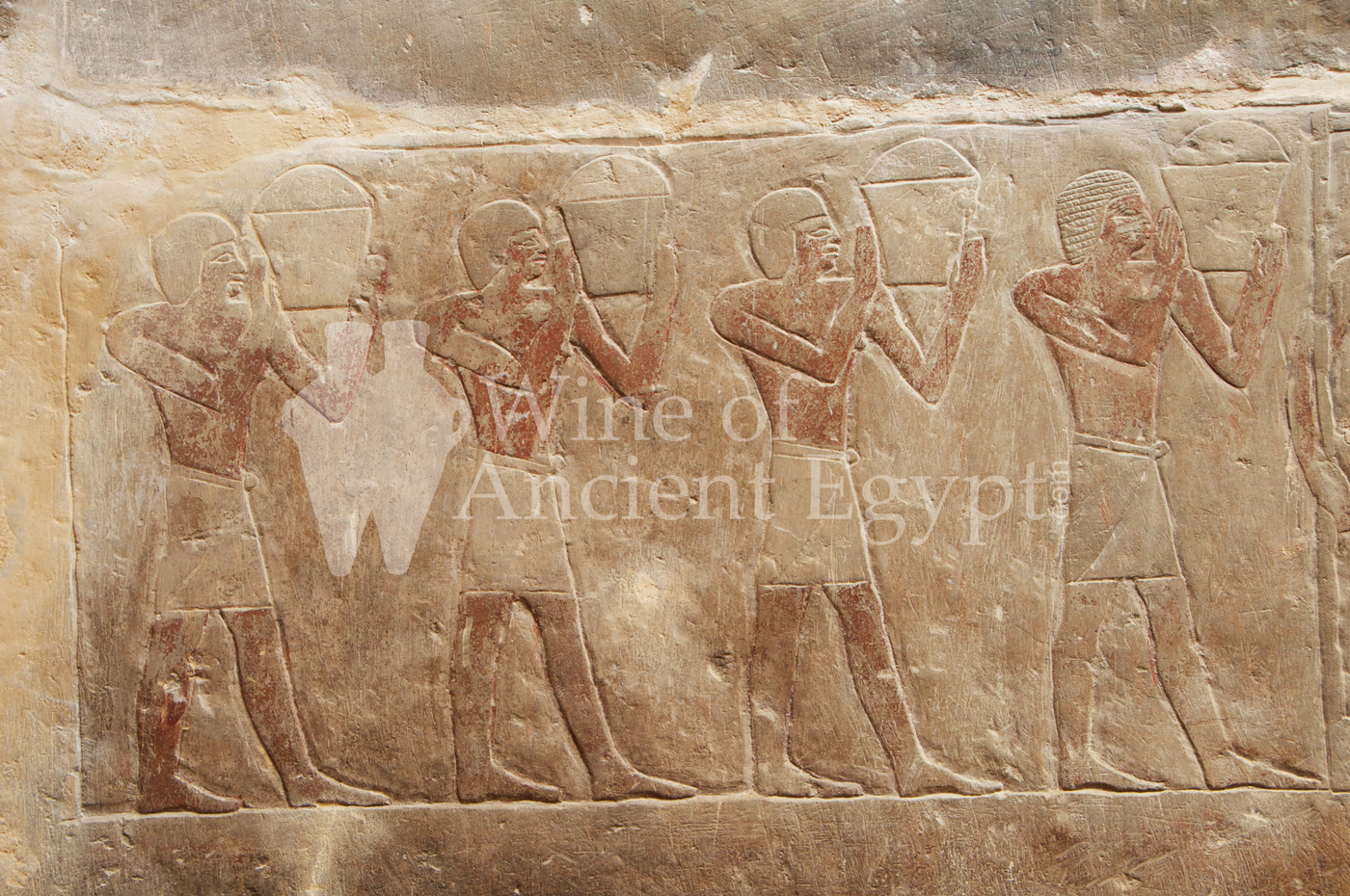 Men transporting baskets of grapes to the wine press. Mereruka. Saqqara. Dynasty 6